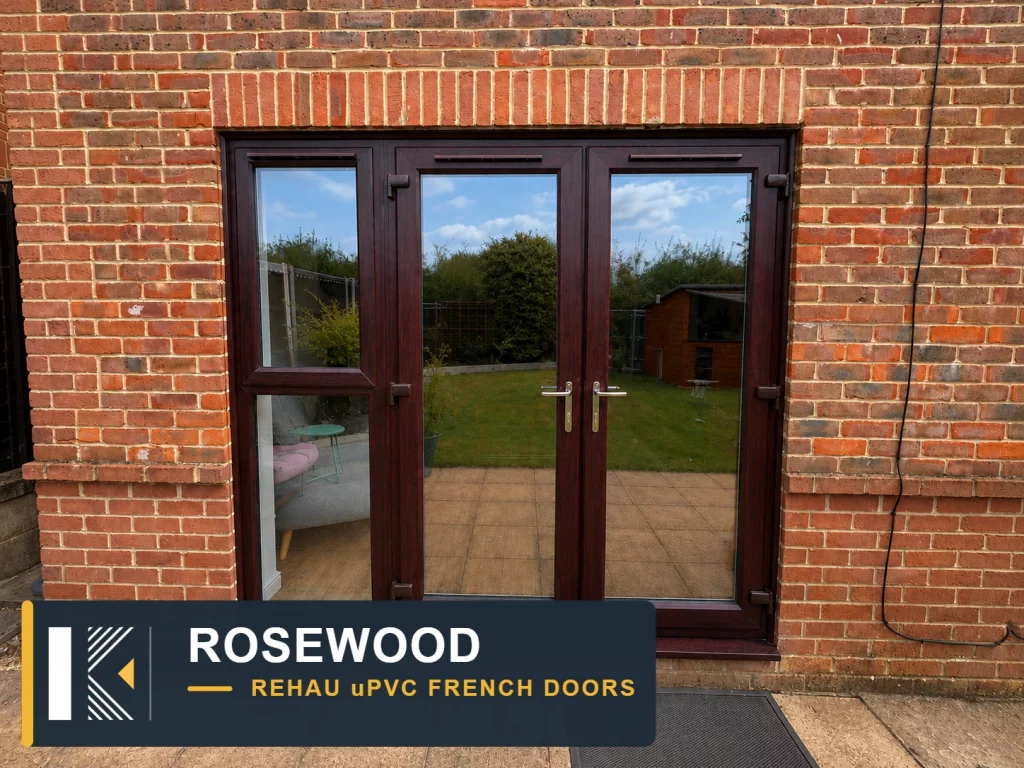 Rosewood uPVC French doors with glazed panels set in a red brick wall, Waterlooville